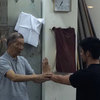 Grandmaster Ip Ching checks Sifu Dawud Tsan's forms at the Wing Tsun Athletic Association.