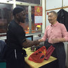 Sifu Garry Mckenzie presents Grandmaster Ip Ching with gifts.