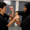 Sifu Julie and Sifu Bee demonstrate Baat Jaarm Dou Faat