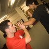 Sifu Ben practices Pad Drills with David