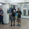 Sifu Kola Fajimolu receiving gift from Sifu Sam Lau.