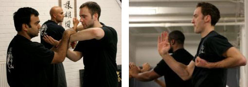 Students Almas and Andy play Chi sau