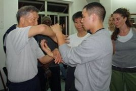 Grand Master Ip Ching demonstrates Chi Sau with Alan