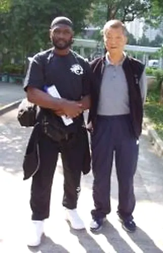 Grand Master Ip Ching & Sifu Garry McKenzie walking in Hong Kong
